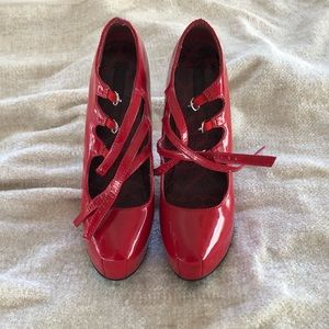 Patent leather cherry red pumps
